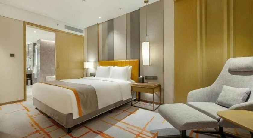 Bed in Hui Feng Wan Yun Hotel Hefei