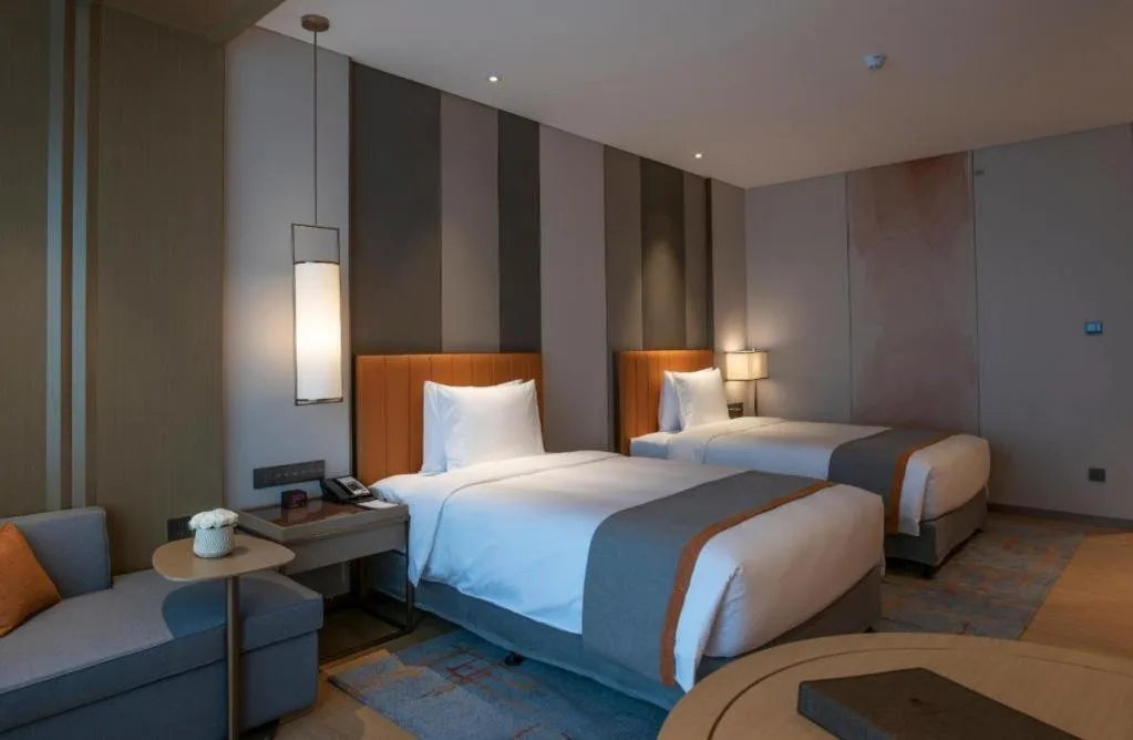 Bed in Hui Feng Wan Yun Hotel Hefei