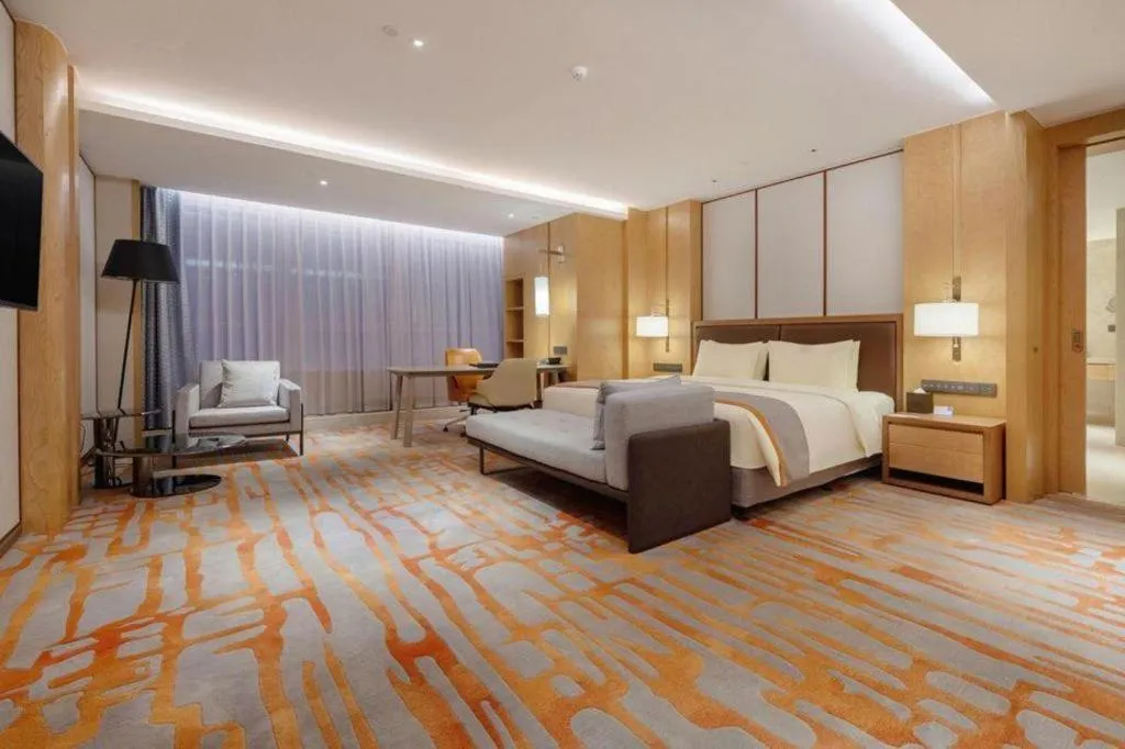 Bed in Hui Feng Wan Yun Hotel Hefei