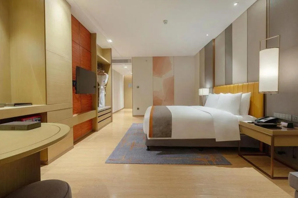 Bed in Hui Feng Wan Yun Hotel Hefei