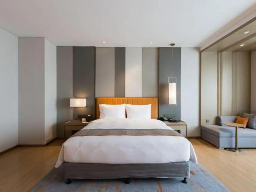 Bed in Hui Feng Wan Yun Hotel Hefei