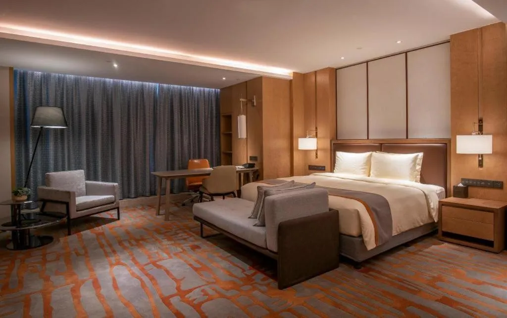 Bed in Hui Feng Wan Yun Hotel Hefei