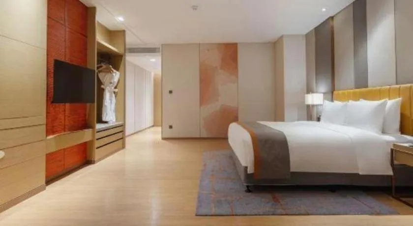 Bed in Hui Feng Wan Yun Hotel Hefei