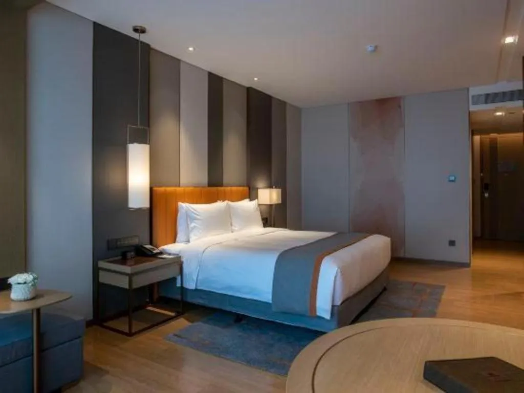 Bed in Hui Feng Wan Yun Hotel Hefei