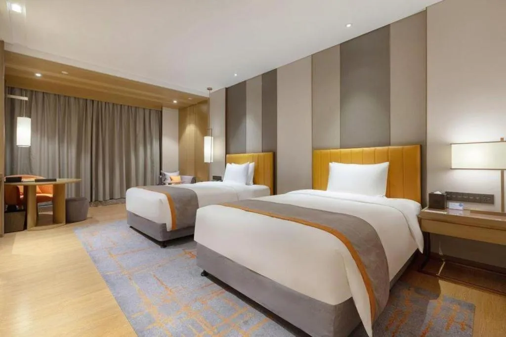 Bed in Hui Feng Wan Yun Hotel Hefei