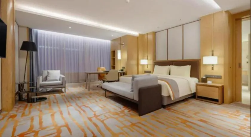 Bed in Hui Feng Wan Yun Hotel Hefei