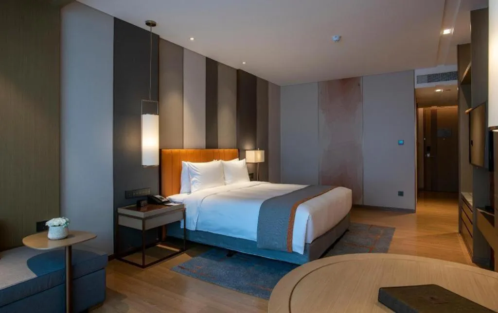 Bed in Hui Feng Wan Yun Hotel Hefei