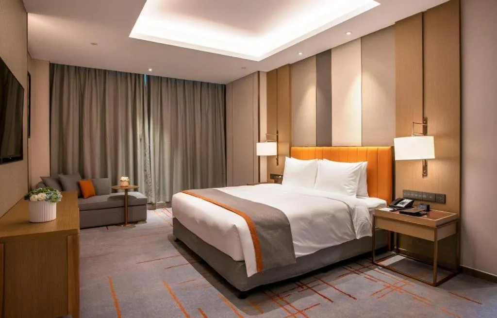 Bed in Hui Feng Wan Yun Hotel Hefei