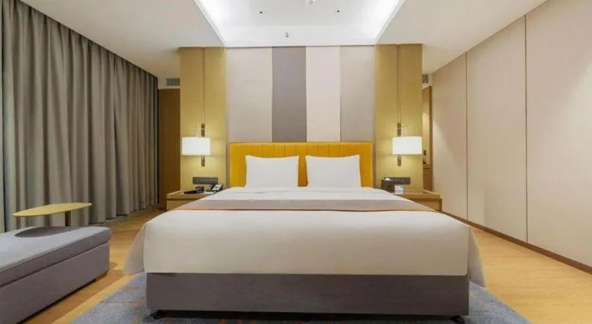 Bed in Hui Feng Wan Yun Hotel Hefei