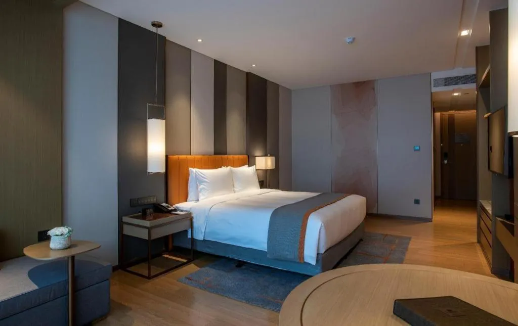 Bed in Hui Feng Wan Yun Hotel Hefei