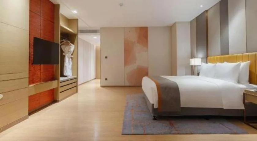 Bed in Hui Feng Wan Yun Hotel Hefei