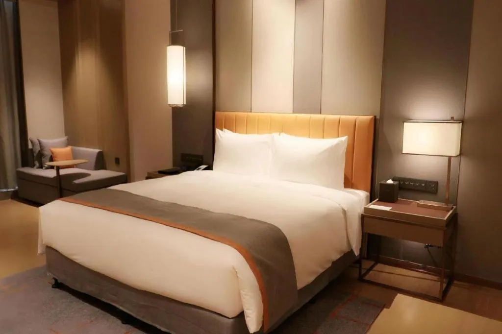 Bed in Hui Feng Wan Yun Hotel Hefei