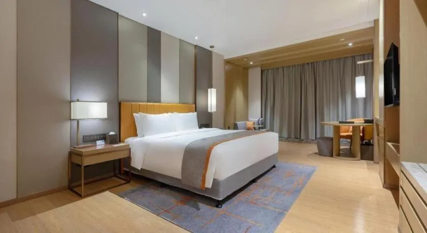 Bed in Hui Feng Wan Yun Hotel Hefei