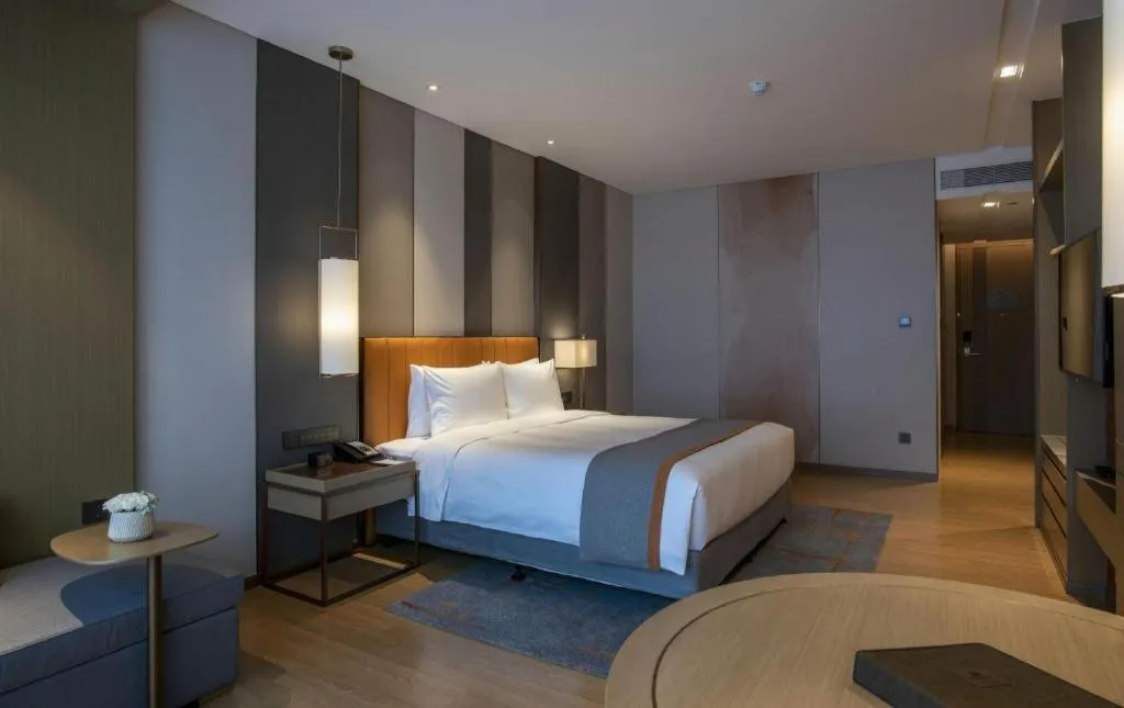 Bed in Hui Feng Wan Yun Hotel Hefei