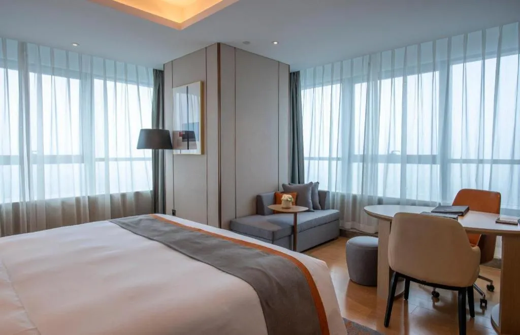 Bed in Hui Feng Wan Yun Hotel Hefei