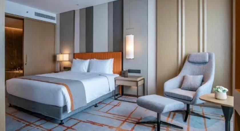 Bed in Hui Feng Wan Yun Hotel Hefei