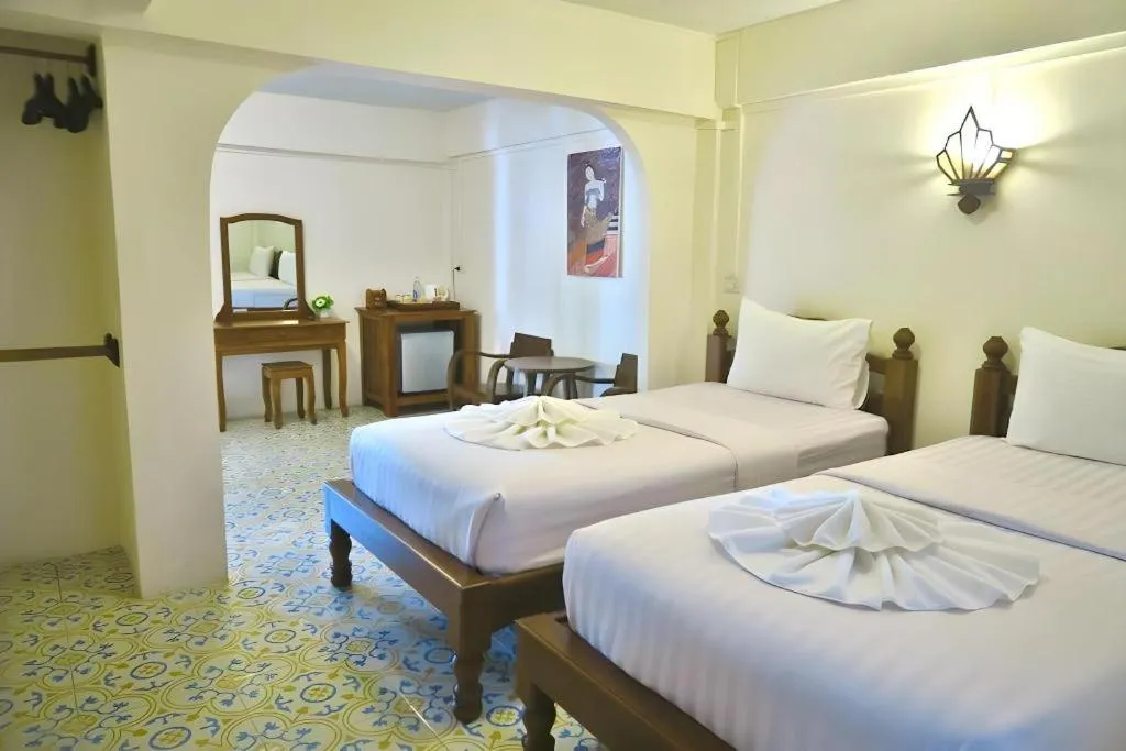 Bed in Nan Lanna Hotel