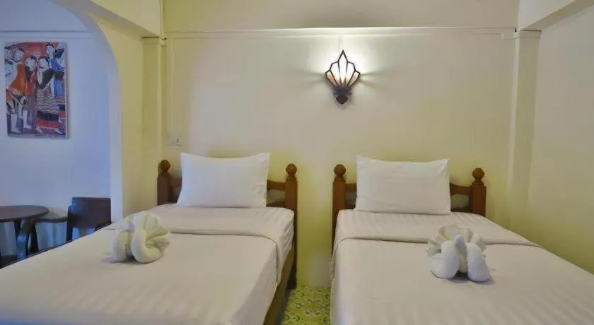 Bed in Nan Lanna Hotel