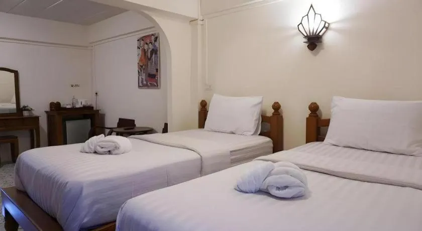 Bed in Nan Lanna Hotel