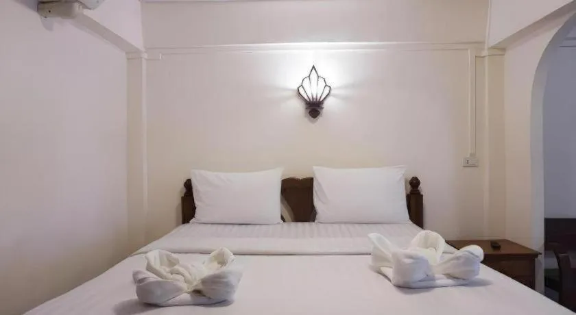 Bed in Nan Lanna Hotel