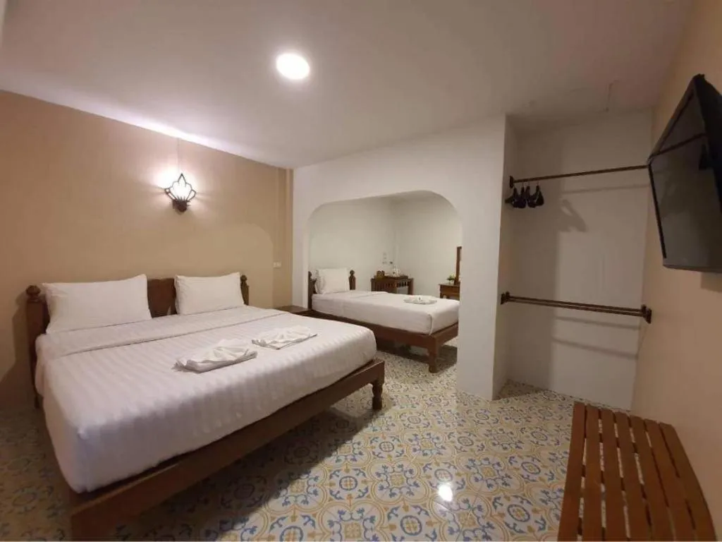 Bed in Nan Lanna Hotel