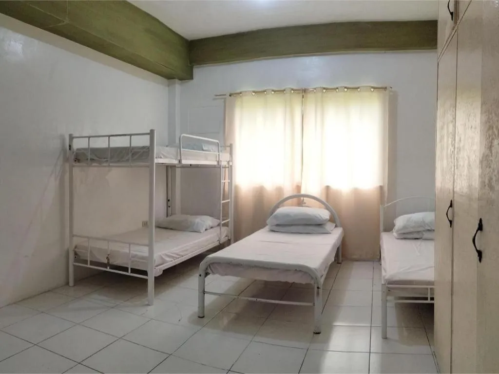 Bed in OYO 800 DDD Habitat Dormtel Bacolod