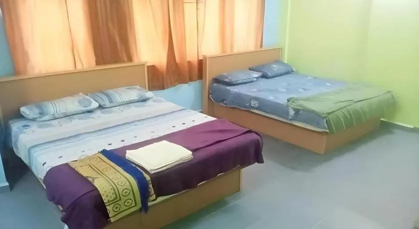 Bed in OYO 90471 Hotel Tepoh