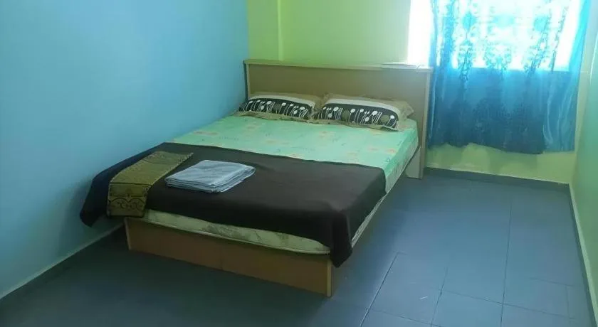 Bed in OYO 90471 Hotel Tepoh