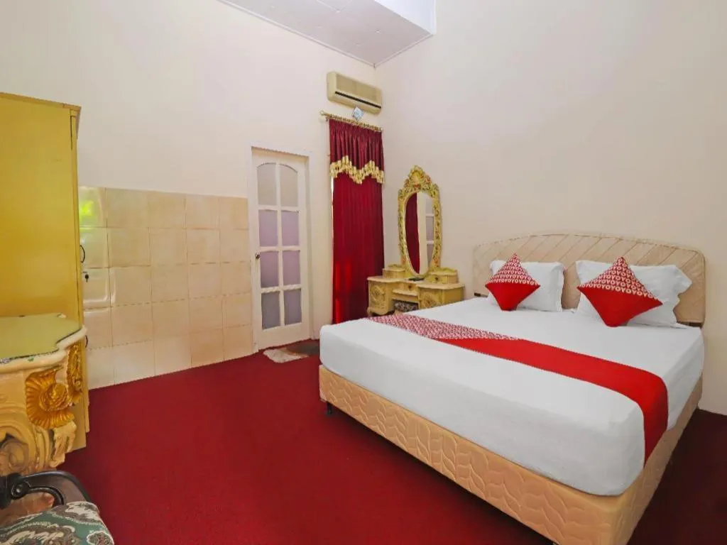 Bed in OYO 2899 Ardilia Bandara Syariah