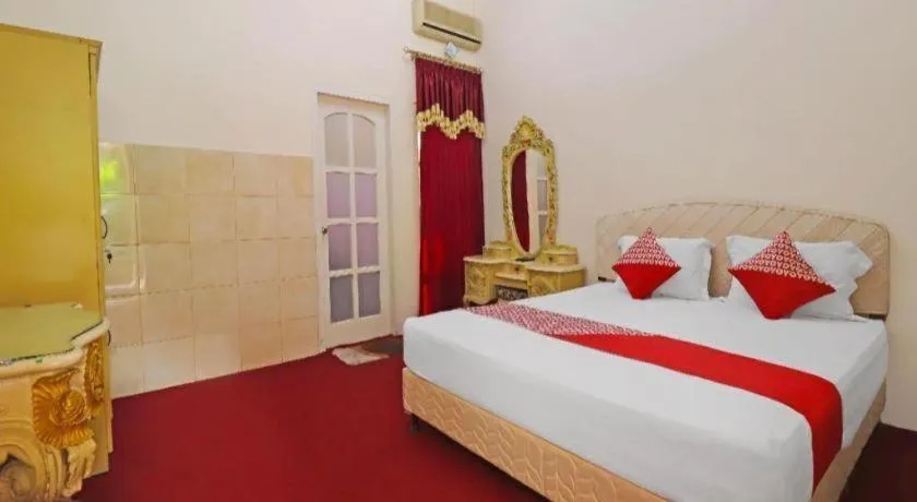 Bed in OYO 2899 Ardilia Bandara Syariah