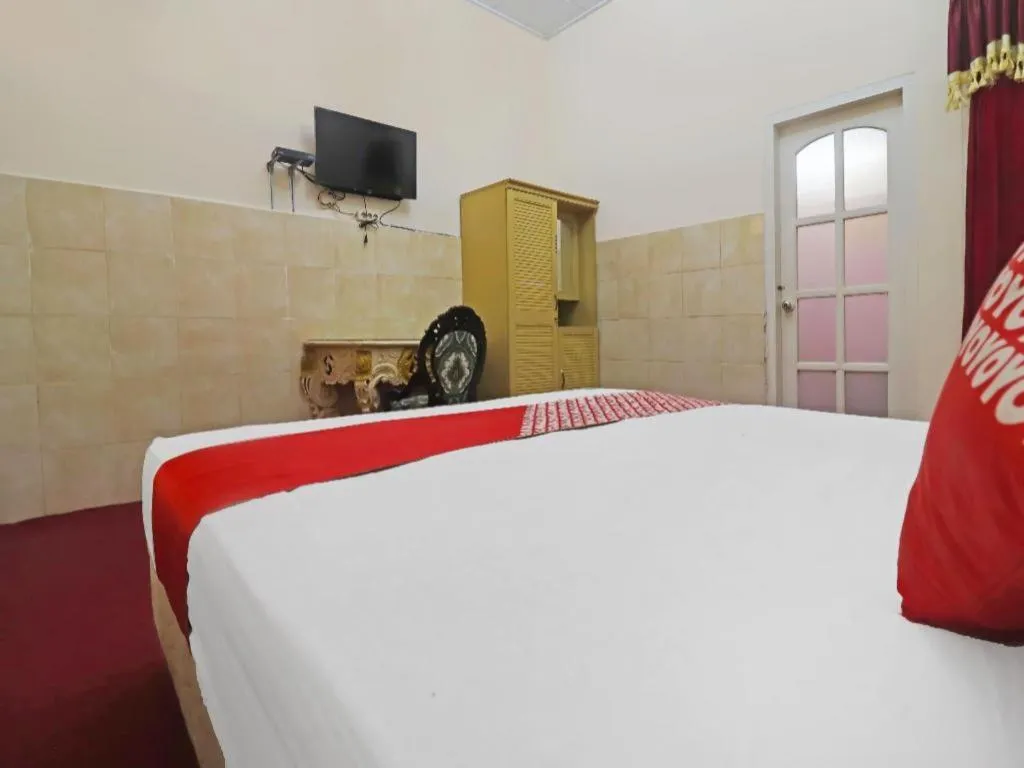 Bed in OYO 2899 Ardilia Bandara Syariah