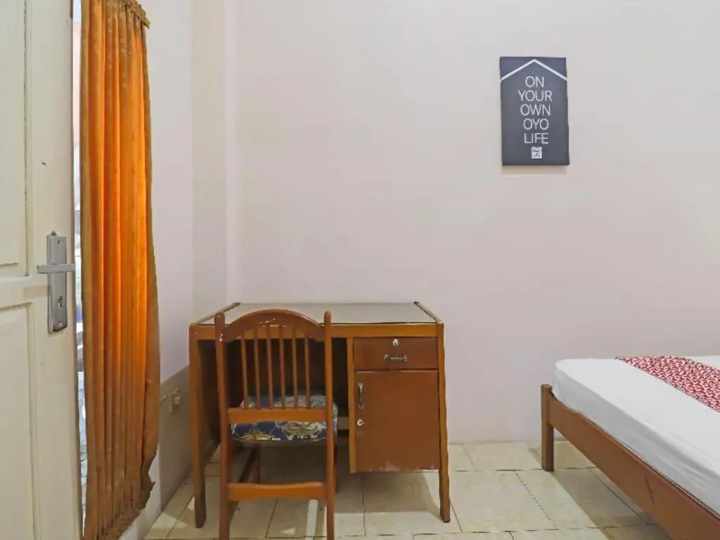Bed in OYO 2899 Ardilia Bandara Syariah