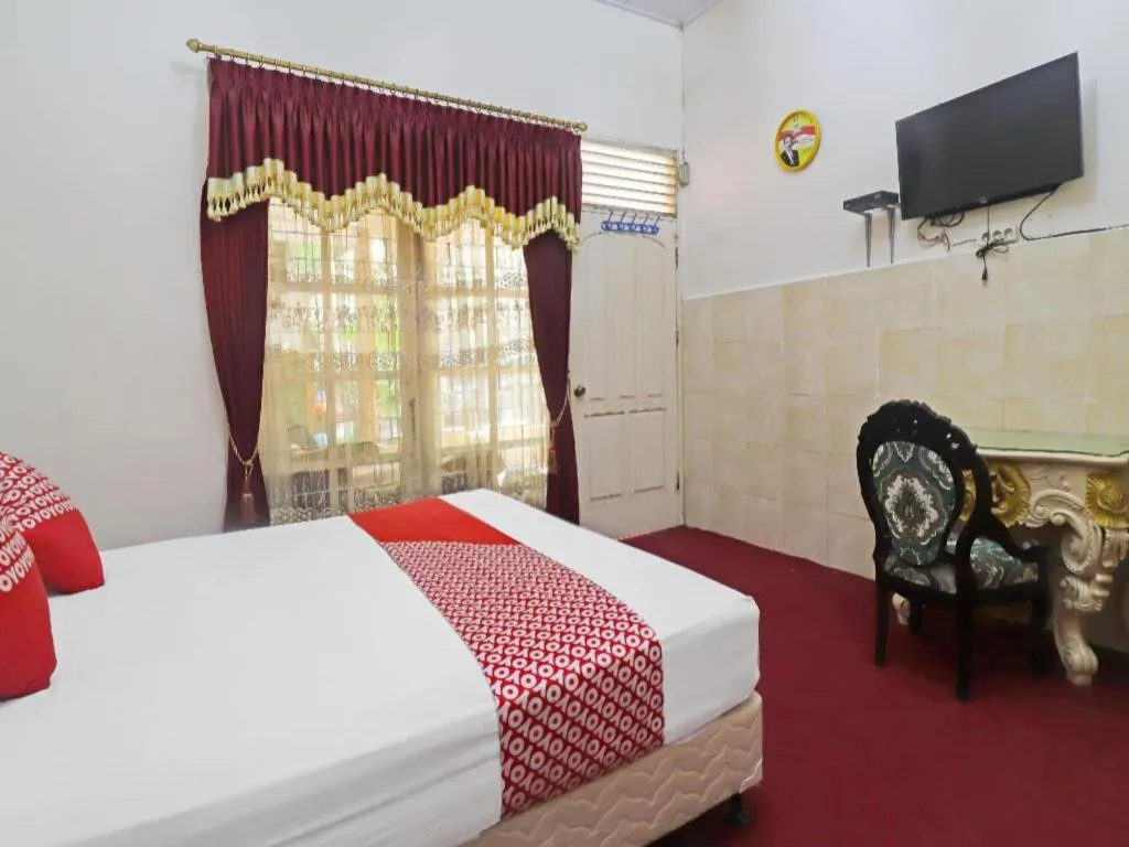 Bed in OYO 2899 Ardilia Bandara Syariah