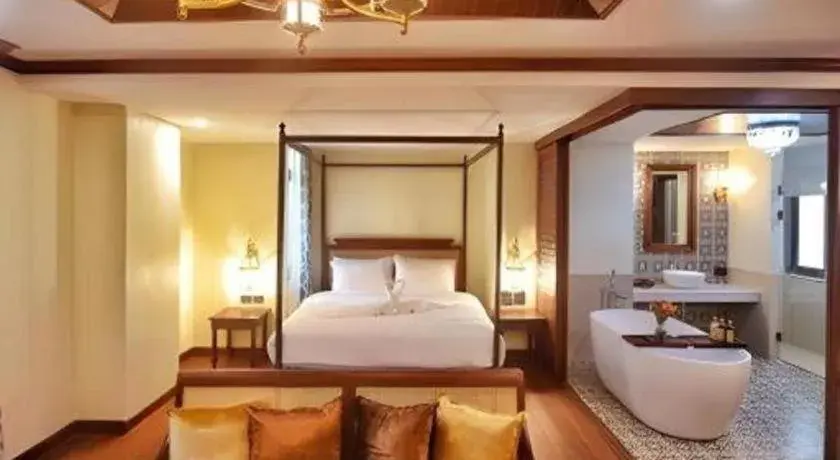 Bed in De Manor Chiang Mai Hotel Bed in De Manor Chiang Mai Hotel