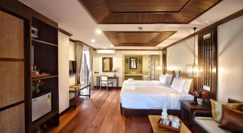 Bed in De Manor Chiang Mai Hotel Bed in De Manor Chiang Mai Hotel