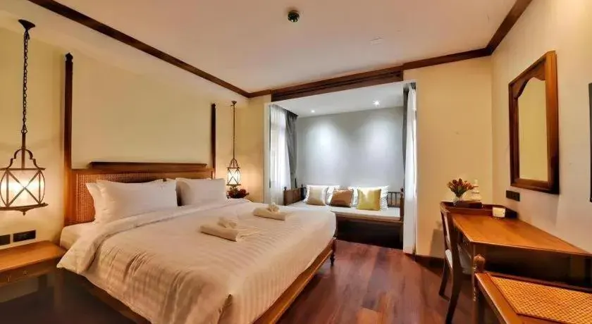 Bed in De Manor Chiang Mai Hotel Bed in De Manor Chiang Mai Hotel