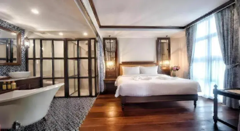 Bed in De Manor Chiang Mai Hotel Bed in De Manor Chiang Mai Hotel