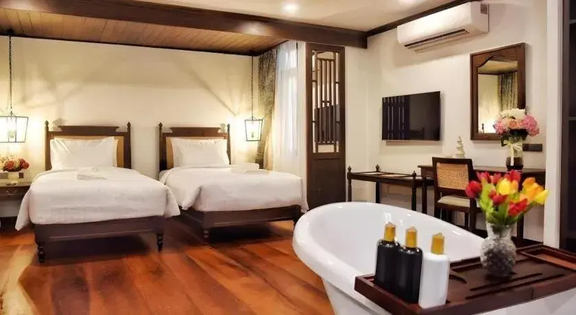 Bed in De Manor Chiang Mai Hotel Bed in De Manor Chiang Mai Hotel