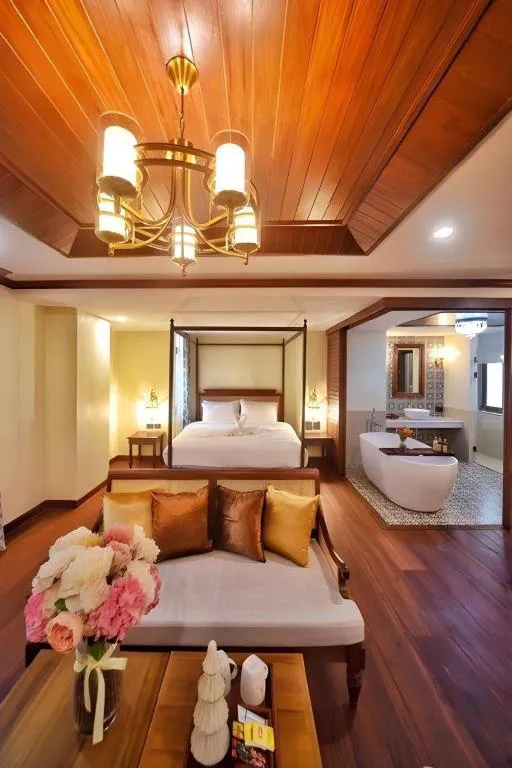 Bed in De Manor Chiang Mai Hotel