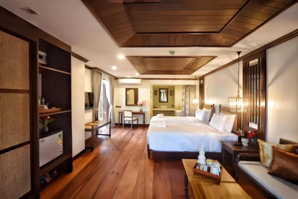 Bed in De Manor Chiang Mai Hotel Bed in De Manor Chiang Mai Hotel