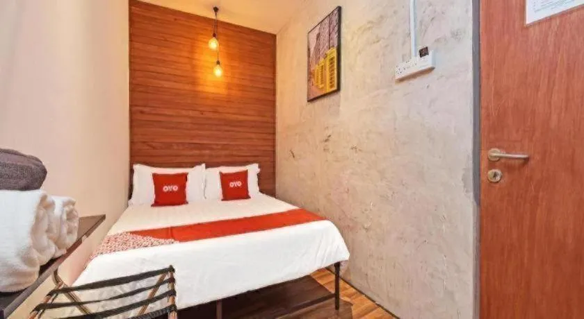 Bed in OYO 90662 The 1975 Hotel