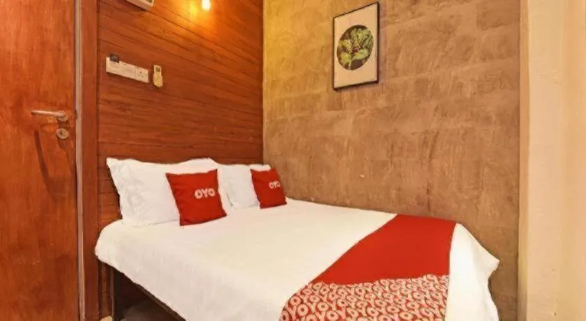 Bed in OYO 90662 The 1975 Hotel
