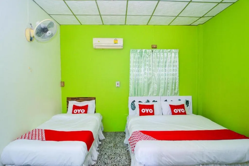 Bed in OYO 499 Pattaraporn Hotel