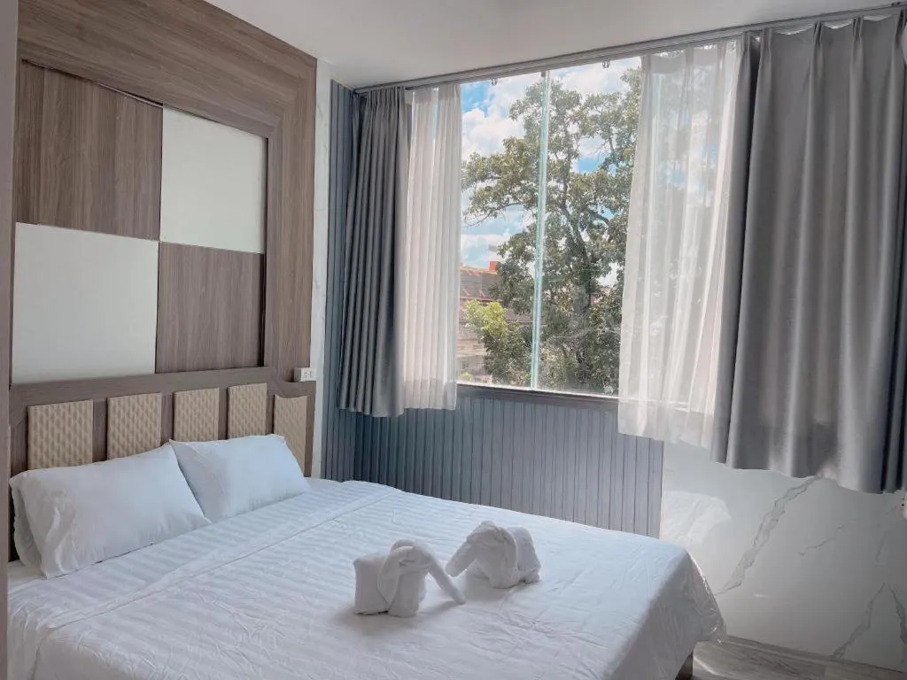 Bed in Heavenchy Hotel