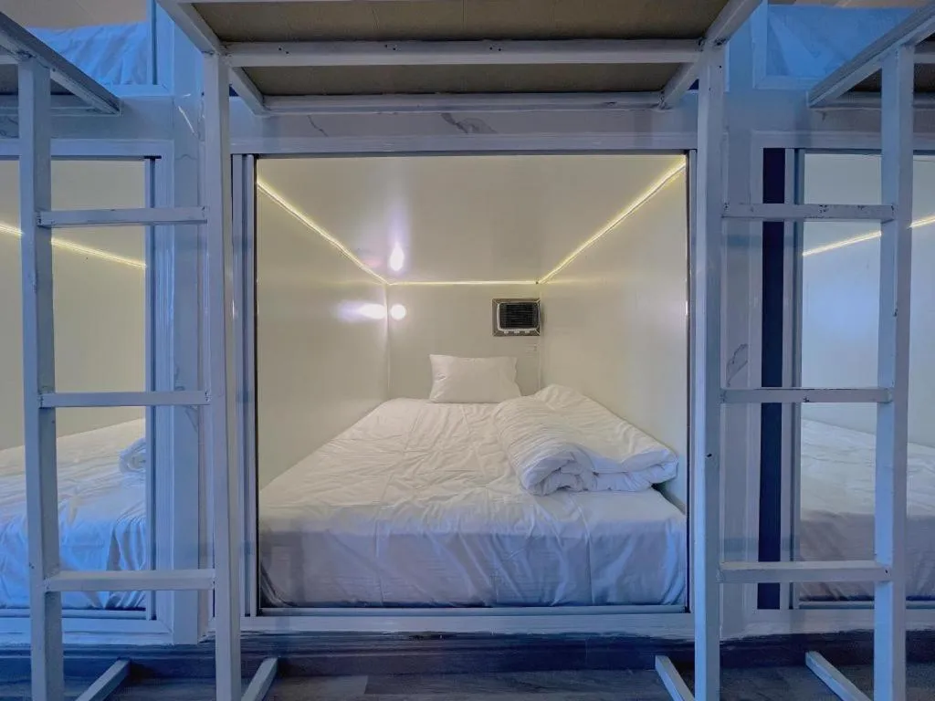 Bed in Heavenchy Hotel