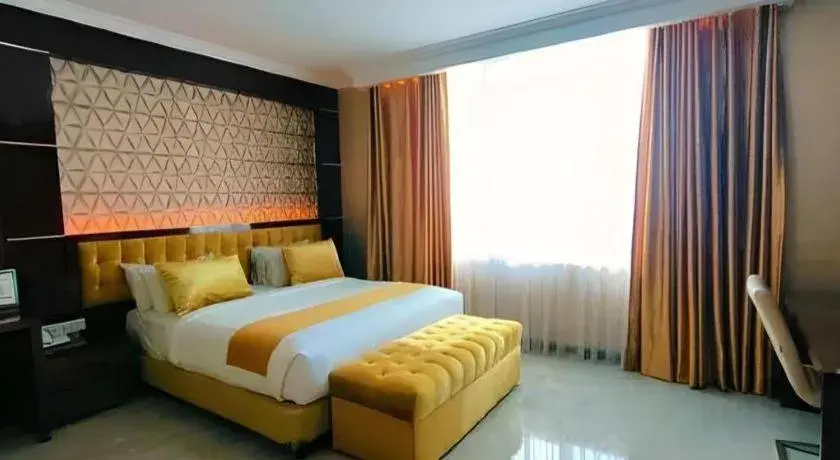 Bed in Sindoro Hotel Cilacap By Conary Bed in Sindoro Hotel Cilacap By Conary