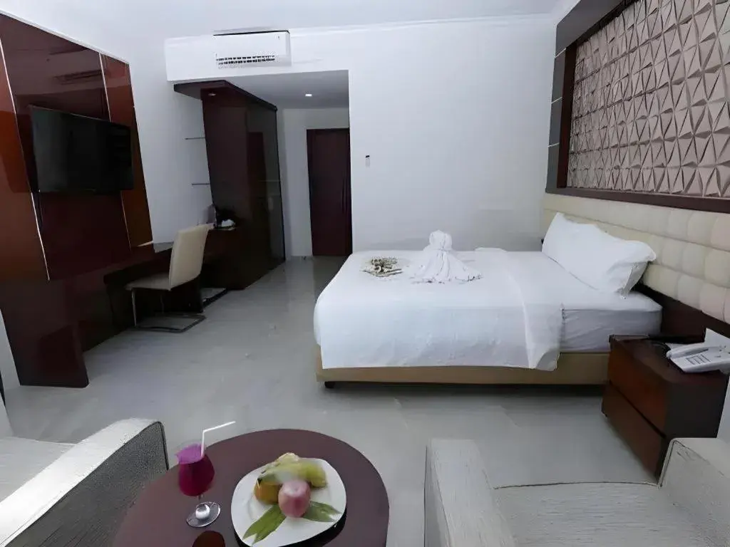Bed in Sindoro Hotel Cilacap By Conary Bed in Sindoro Hotel Cilacap By Conary