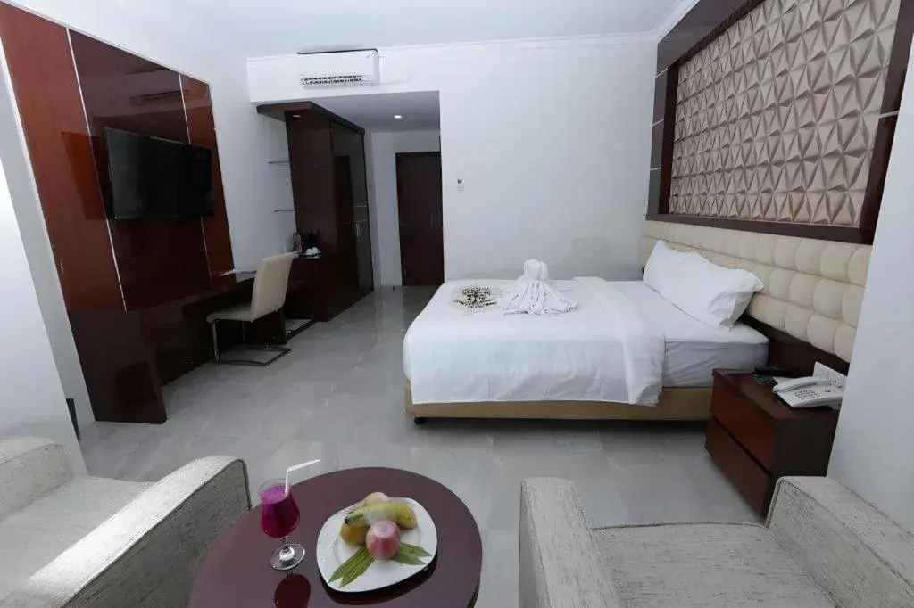 Bed in Sindoro Hotel Cilacap By Conary Bed in Sindoro Hotel Cilacap By Conary
