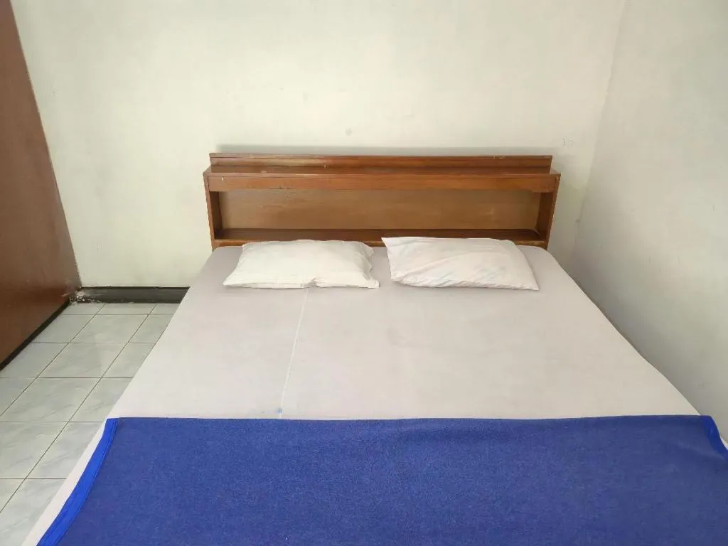 Bed in Capital O 94094 New Lembah Nyiur