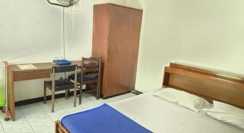 Bed in Capital O 94094 New Lembah Nyiur